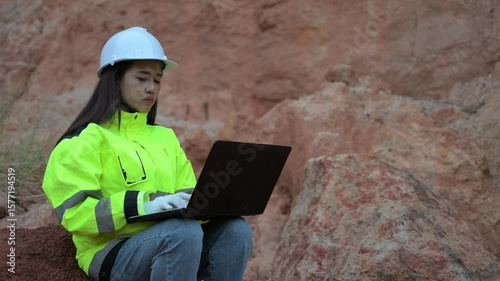Geologist surveying mine,Explorers collect soil samples to look for minerals.