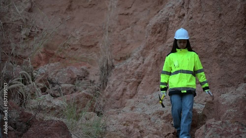 Geologist surveying mine,Explorers collect soil samples to look for minerals.