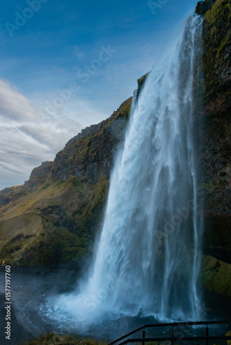 Seljalandsfoss is unique—you can walk behind it. Nearby, Gljúfrabúi is hidden in a canyon, offering a secret, misty experience