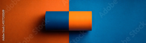 Minimalistic abstract background with blue and orange hues and a rolled paper element, captured in flat lay style for creative branding, advertisements, flyers or modern presentation visuals.