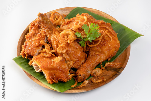 Vászonkép Hat Yai Fried Chicken, crispy fried chicken with fried on a white background