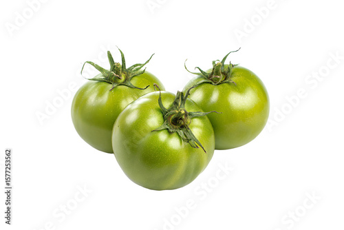 three green tomatoes on a white background