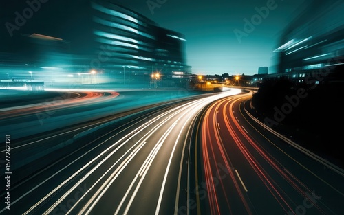 Nighttime expressway motion blur with vibrant light streaks of cars and buildings