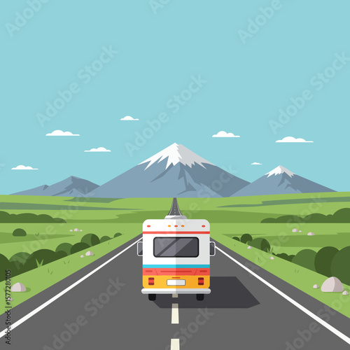 A colorful camper van drives along a scenic highway towards snow-capped mountains, set against a clear blue sky, creating a sense of adventure and wanderlust.