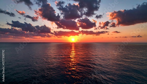 Dramatic sunset over calm ocean