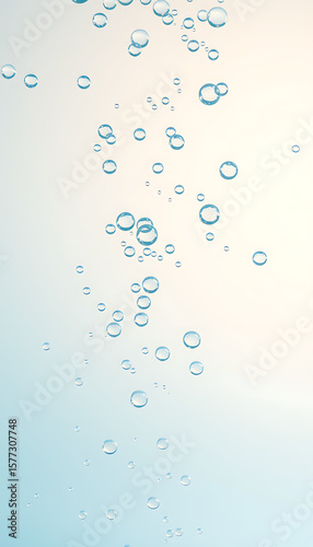 Floating air bubbles ascend through a clear liquid, creating a refreshing, airy feel perfect for backgrounds or designs involving cleanliness and freshness.