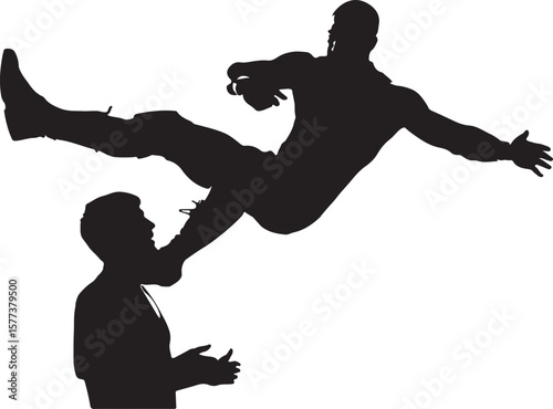 Silhouette of a man performing a flying kick towards another person isolated