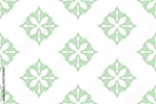 Seamless Ikat Vector Pattern in Green  – Traditional Textile Design.