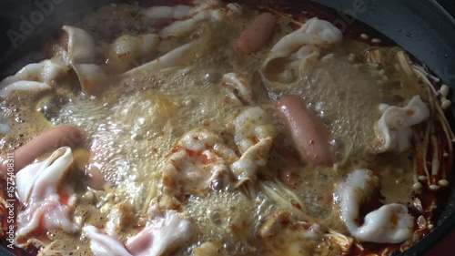 Boiling mala pork hot pot broth soup. Cooking concept 