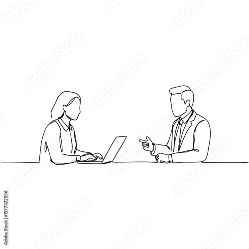 Job candidate talking with recruiter while using laptop in office  