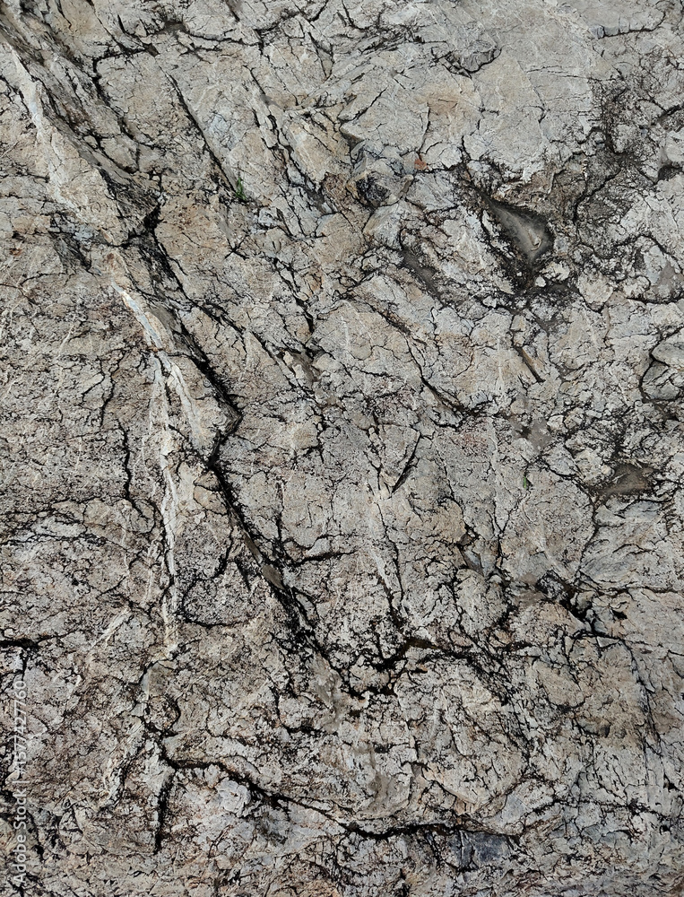 Fototapeta premium Natural gray dark rough grainy stone texture background, backdrop