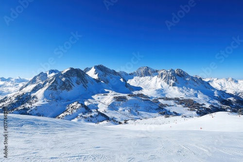 Mountain peaks stretching under blue sky