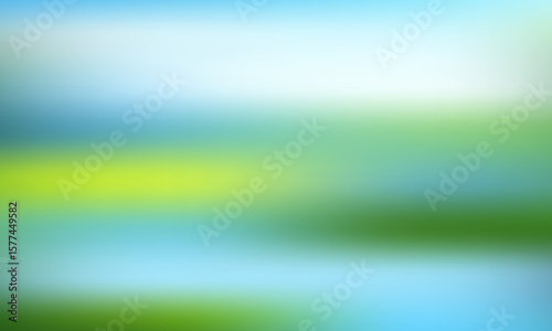 Soft focus abstract background with gentle gradients of sky blue and vibrant green creating a serene and tranquil natural landscape