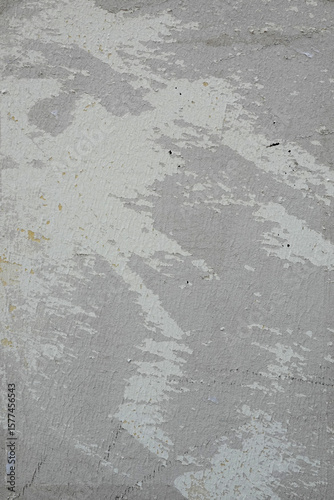 Peinture grise écaillée sur un mur