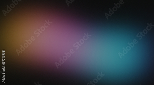 Soft gradient of warm orange purple and cool blue on black background