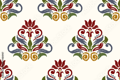 Ikat floral paisley embroidery on white background. Traditional ethnic ikat, aztec abstract vector pattern, seamless pattern in tribal, folk embroidery and mexican style.