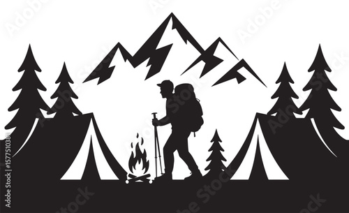 Silhouette of a hiker with backpack and campfire at mountains