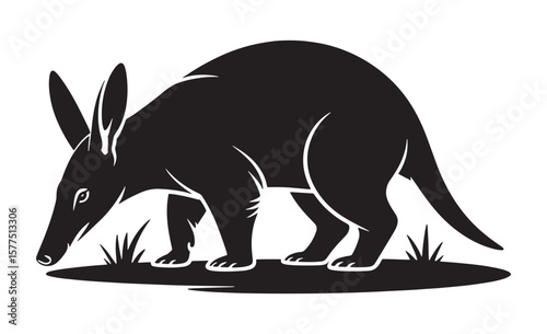 Stylized black silhouette of an aardvark foraging in grass