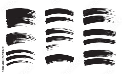 Collection of black ink brush strokes and swirls on white background