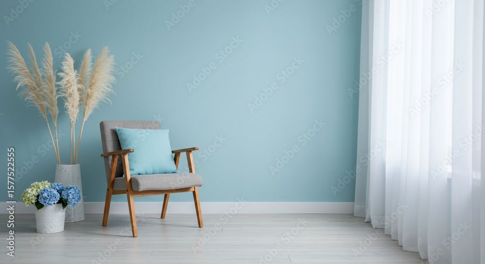 Fototapeta premium Minimalist interior design with chair, pampas grass and blue accent wall decor