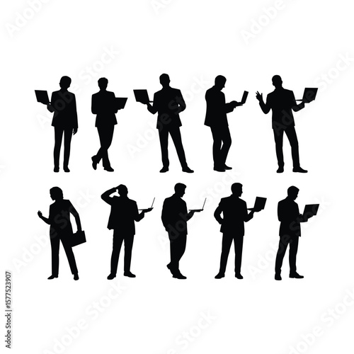 Silhouetted business professionals using laptops depicting corporate technology and digital communication