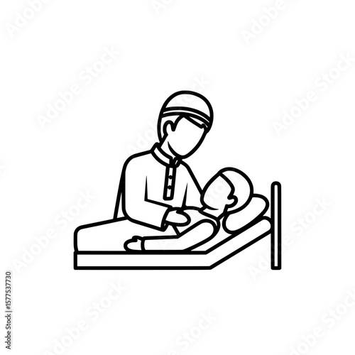 Hospital nurse caring for a patient in bed