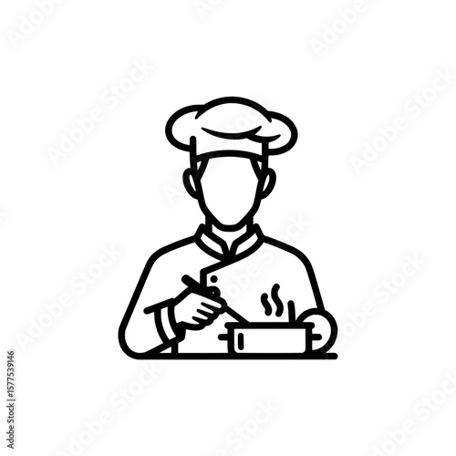 Chef cooking with a steaming pot in professional kitchen