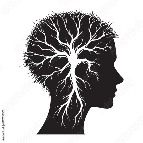 Silhouette of a human head with a tree growing inside