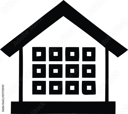 Stylized black and white icon representing a house with a grid of windows symbolizing home and architecture