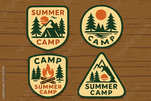 A collection of vintage outdoor summer camp logo patches on a wooden board, featuring hand-drawn and vector emblem designs suitable for shirts, stamps, stickers, logos, and labels