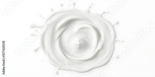 A unique splash of milk forms a circular shape, creating a captivating vortex effect. The clean backdrop enhances the visual impact, showcasing artistic creativity in liquid photography