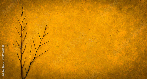 The golden yellow texture has an old dry branch with a sad feeling for the illustration.