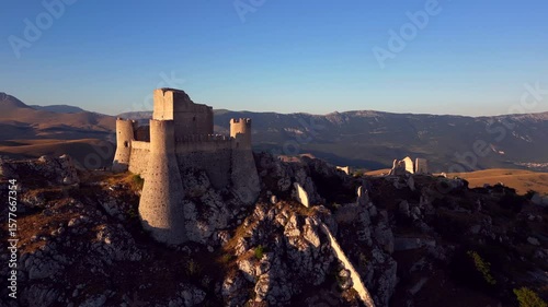 Italy, July 11, 2025: Aerial drone view of the Rocca Calascio fortress at sunset, in the province of L'Aquila in Abruzzo. Here, you can experience peace, tranquility, and ancient history.