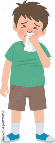 Boy with a tissue, feeling unwell.