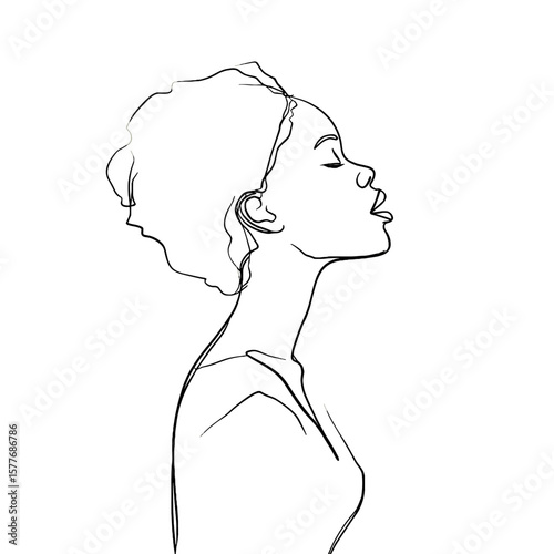 African American woman in profile with closed eyes and serene expression  