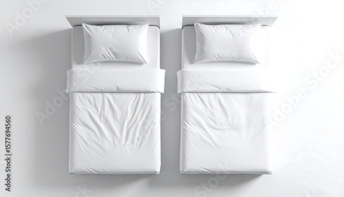 Two white twin beds, top-down view