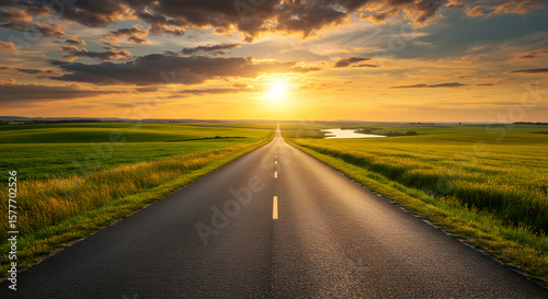 The open road awaits your journey, a scenic sunset drive on a long asphalt highway towards a bright future and endless possibilities.