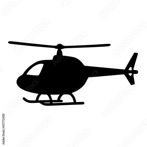 Silhouette of a Helicopter in Flight