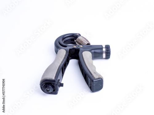 Bild auf Leinwand Low angle of hand gripper fitness tool isolated on white background with copy space