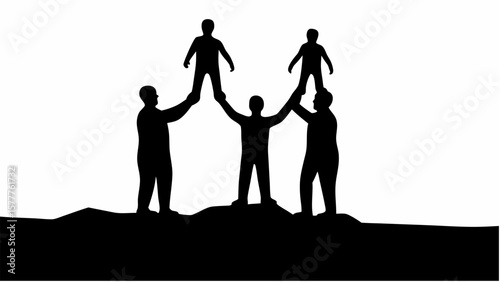 Silhouette of people lifting others on a hilltop