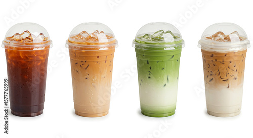 Four different iced drinks in clear plastic cups with dome lids arranged on a white background