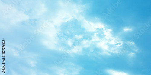 Blue sky, sun, clouds. A peaceful moment with underlying complexity. A reflection of the sky on thin clouds. Hidden emotions beneath a bright exterior like feeling melancholic on a good day background