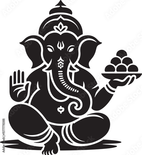 Silhouette of the Hindu God Lord Ganesha with a plate of traditional Indian sweets. 