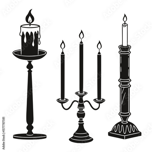 Black candle holders with burning flames candles candlestick