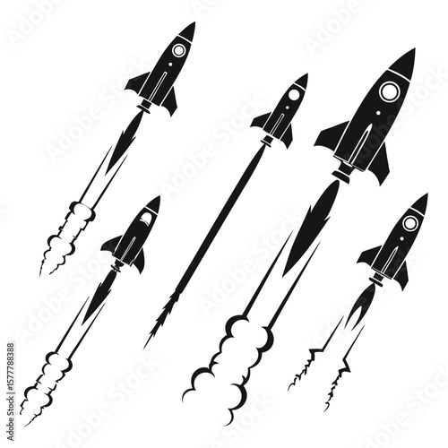 Black rocket silhouettes with trails space launch