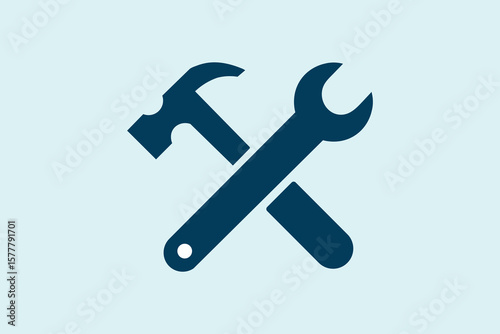 Crossed wrench and hammer tools repair maintenance icon