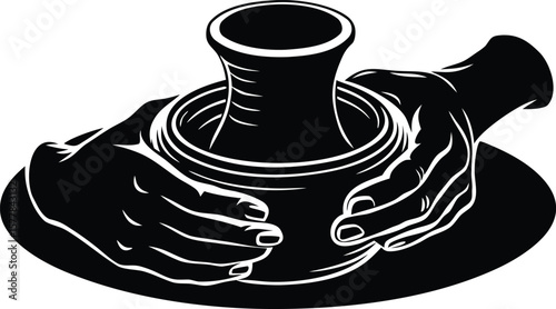 Hands skillfully shape clay on a pottery wheel, creating a vessel