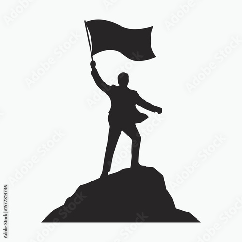 Silhouette of a Man Holding Flag on a Mountain Peak