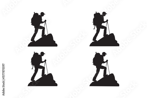 Silhouette of a hiker with a backpack and trekking poles on rocky terrain
