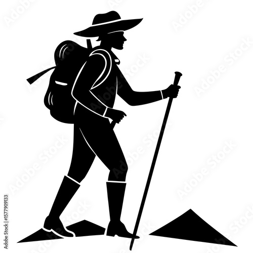 A silhouette of a hiker with a backpack walking on a mountain